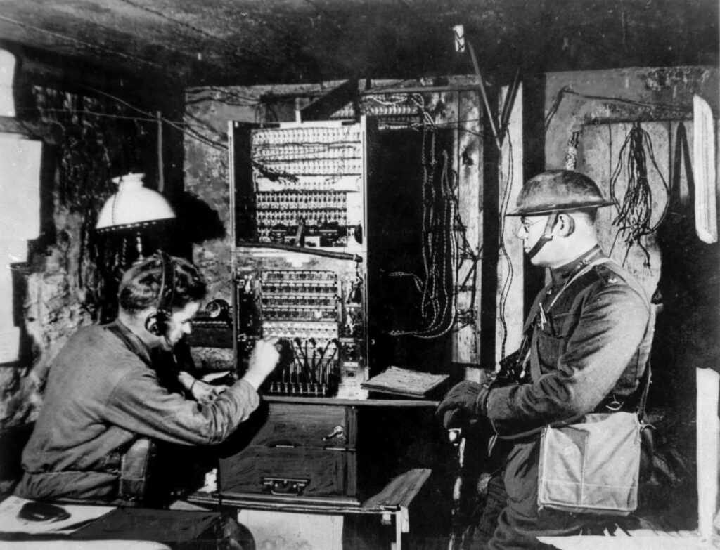 U.S. soldiers operate a radio switchboard just behind the front line